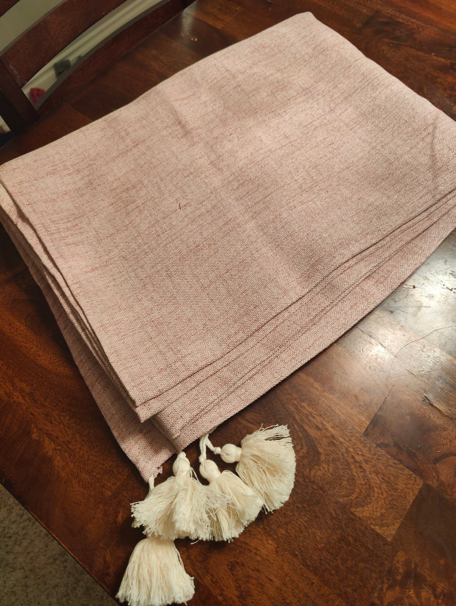 salmon red tablecloth folded